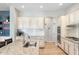 Bright kitchen featuring granite countertops, stainless steel appliances, and an island sink at 27606 N 61St Pl, Scottsdale, AZ 85266