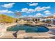 Backyard features sparkling pool, outdoor seating, and meticulously maintained landscaping at 27606 N 61St Pl, Scottsdale, AZ 85266