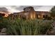 Exterior view of The Canal restaurant in a commercial area with desert landscaping at 27606 N 61St Pl, Scottsdale, AZ 85266