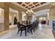 Elegant dining room with decorative ceiling, chandelier, and spacious layout for entertaining at 27701 N Lucero Dr, Rio Verde, AZ 85263