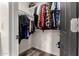 Well-organized closet with shelving and hanging racks for ample storage space at 30124 N Sunray Dr, San Tan Valley, AZ 85143