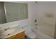 Modest bathroom featuring a shower-tub combo, single sink vanity, and a neutral color palette at 3345 W Laurel Ln, Phoenix, AZ 85029