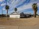 A single-story home in a desert climate has chain-link fence and drought-tolerant landscaping at 3345 W Laurel Ln, Phoenix, AZ 85029