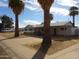 Single story home with covered parking and drought tolerant front yard landscaping at 3345 W Laurel Ln, Phoenix, AZ 85029