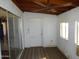 Sunroom featuring a ceiling fan, white walls, and sliding doors at 3345 W Laurel Ln, Phoenix, AZ 85029