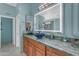 Bathroom features a marble countertop vanity with a contemporary vessel sink and modern fixtures at 3459 E Mockingbird Dr, Gilbert, AZ 85234