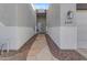 Inviting front walkway leading to the main entrance with decorative door at 3459 E Mockingbird Dr, Gilbert, AZ 85234