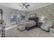 Main bedroom with shiplap accent wall, sliding doors, and serene decor at 3459 E Mockingbird Dr, Gilbert, AZ 85234