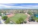 Aerial view of a well-maintained baseball field with lush green grass and surrounding community at 3648 N 162Nd Ave, Goodyear, AZ 85395