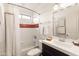 Neat bathroom with shower-tub combo, tiled accents, and a classic white vanity at 3648 N 162Nd Ave, Goodyear, AZ 85395