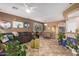 Spacious living room with comfortable seating, stylish decor, and a view into the dining area at 3767 W Desert Creek Ln, Phoenix, AZ 85086