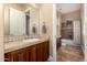 Bathroom featuring wood cabinetry and a separate shower and tub at 42043 N Bradon Way, Phoenix, AZ 85086