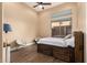 Bright bedroom featuring light colored walls, window and furnishings at 42043 N Bradon Way, Phoenix, AZ 85086