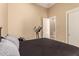 Comfortable bedroom featuring an exercise machine and closet at 42043 N Bradon Way, Phoenix, AZ 85086