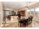 Open-concept kitchen and dining area, featuring ample cabinetry, modern appliances, and natural light at 42043 N Bradon Way, Phoenix, AZ 85086