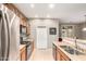 Bright and airy kitchen featuring stainless steel appliances and tile flooring at 42577 W Rosalia Dr, Maricopa, AZ 85138