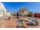 A backyard fire pit area is set with comfortable seating and rustic charm, ideal for outdoor gatherings at 44706 N 10Th Way, New River, AZ 85087