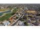 A high angle of a home in a neighborhood next to a baseball field and other community facilities at 4506 E Arapahoe St, Phoenix, AZ 85044