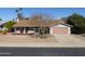 Front exterior elevation of a single story home with a well maintained yard and driveway, creating a welcoming curb appeal at 4506 E Arapahoe St, Phoenix, AZ 85044