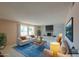 Staged living room with neutral furniture, a brick fireplace, and large windows providing natural light at 4506 E Arapahoe St, Phoenix, AZ 85044