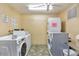 Bright laundry room with front load washers and dryers for community use at 4620 N 68Th St # 116, Scottsdale, AZ 85251