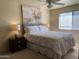 Bright main bedroom with natural light and a decorative neutral color palette at 4620 N 68Th St # 116, Scottsdale, AZ 85251