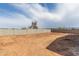 Expansive backyard with block wall, providing a blank canvas for landscaping and outdoor enjoyment at 4821 S 12Th St, Phoenix, AZ 85040