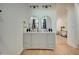 Elegant bathroom featuring a double vanity, framed mirrors and stylish modern fixtures at 4821 S 12Th St, Phoenix, AZ 85040