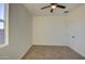 Neutral bedroom with a ceiling fan and carpet at 4821 S 12Th St, Phoenix, AZ 85040