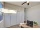 Home office featuring natural light, a functional desk setup, and neutral tones for productivity at 4821 S 12Th St, Phoenix, AZ 85040