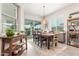 Bright dining room features a large window and sliding glass doors, perfect for entertaining guests at 4887 N 184Th Ln, Goodyear, AZ 85395