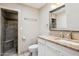 Bathroom vanity with granite countertop and large framed mirror at 50880 W Val Vista Rd, Maricopa, AZ 85139