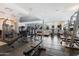 Enjoy a fully-equipped fitness center with treadmills, weights, and views to mountains in the distance at 5455 E Lincoln Dr # 2009, Paradise Valley, AZ 85253