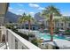 Resort style swimming pool with palm trees and view of mountains from balcony at 5455 E Lincoln Dr # 2009, Paradise Valley, AZ 85253