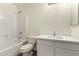 Bright bathroom featuring a modern vanity with white countertops and tile floors at 6042 W Warner St, Phoenix, AZ 85043