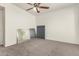 Bedroom with neutral carpet and ceiling fan at 6042 W Warner St, Phoenix, AZ 85043