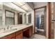 Bathroom with dual sinks and marble countertop at 614 W Mcnair St, Chandler, AZ 85225