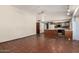 Living room featuring tile flooring, access to kitchen and high ceilings at 614 W Mcnair St, Chandler, AZ 85225