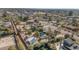 Aerial view of a residential area featuring homes with pools and lush landscaping, showcasing a desirable community at 6420 E Gary Rd, Scottsdale, AZ 85254