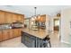 Traditional kitchen with island, granite countertops, stainless steel appliances, and custom cabinetry at 6420 E Gary Rd, Scottsdale, AZ 85254