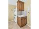 The laundry room includes a stacked washer and dryer, and storage at 6420 E Gary Rd, Scottsdale, AZ 85254