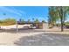 Spacious carport with vehicle and storage at 6420 E Gary Rd, Scottsdale, AZ 85254