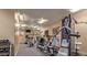 Well-equipped gym with modern exercise machines, weights, and ceiling fans for a comfortable workout at 705 W Queen Creek Rd # 2006, Chandler, AZ 85248