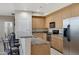 Well-equipped kitchen with modern appliances and stylish cabinets at 705 W Queen Creek Rd # 2006, Chandler, AZ 85248