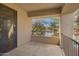 Open-air balcony showcasing views of the community landscaping and blue sky at 705 W Queen Creek Rd # 2006, Chandler, AZ 85248