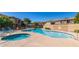 Community pool and spa with lounge chairs and landscaped surroundings at 705 W Queen Creek Rd # 2006, Chandler, AZ 85248