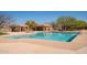 Sparkling community pool featuring inviting lounge areas, perfect for relaxation and social gatherings at 7357 E Rochelle Cir, Mesa, AZ 85207