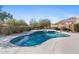 Refreshing pool with a built-in spa and a stone surround offers a relaxing outdoor experience at 7357 E Rochelle Cir, Mesa, AZ 85207