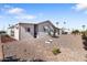 Backyard featuring low maintenance landscaping with rock and some desert vegetation at 7807 E Main St # Cc-84, Mesa, AZ 85207