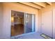 Inviting outdoor patio with access to the living area through sliding glass doors at 8260 E Arabian Trl # 170, Scottsdale, AZ 85258